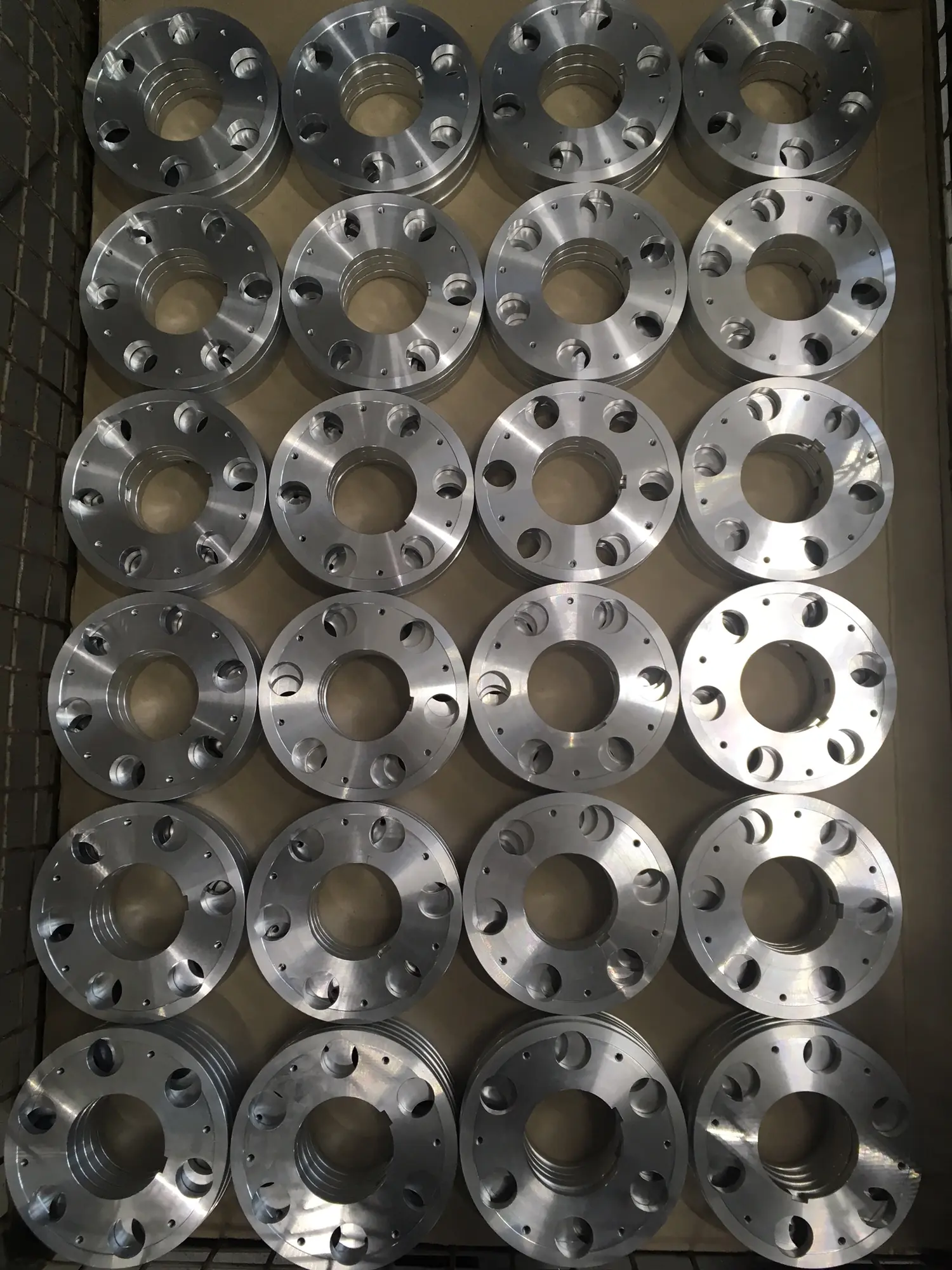 Batch of precision turned flanges